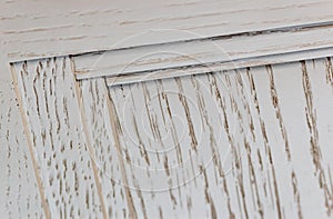 element of textured classic shabby chic kitchen facade in macro. background for template solid wood textured decorative