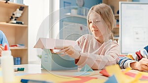 Elementary School Arts & Crafts Class: Cute Little Blond Girl Has Fun with Her Classmates on the H