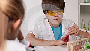 Elementary school chemistry class - kids experimenting