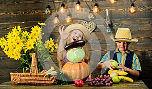 Elementary school fall festival idea. Autumn harvest festival. Children play vegetables pumpkin cabbage. Kids girl boy