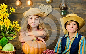 Elementary school fall festival idea. Kids girl boy wear hat celebrate harvest festival rustic style. Celebrate harvest