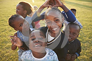 Elementary school kids having fun outdoors, high angle