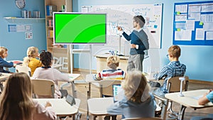 Elementary School Physics Teacher Uses Interactive Digital Whiteboard With Green Screen Mock-up