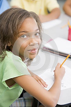 Elementary school pupil at desk