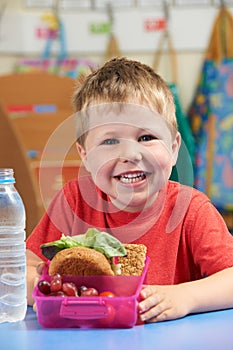 Elementary School Pupil With Healthy Lunch Box
