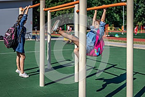 Elementary school students playing on the school playground