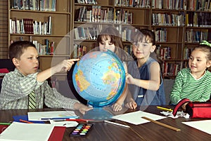 Elementary school students studying photo