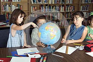 Elementary school students studying photo