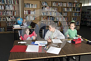 Elementary school students studying photo