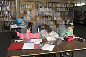 Elementary school students studying