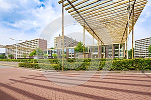 Elementry school with large apartment buildings on the background, no people