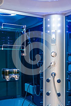 Elements of the bathroom interior-modern design, chrome details, parts of the shower cabin