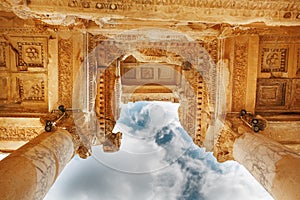 Elements of the columns of the architectural structure against the blue sky of the Library of Celsus in Ephesus, Turkey