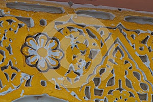 Elements of designer decoration of exterior parts of houses on streets of the city of Tangier in the Kingdom of Morocco