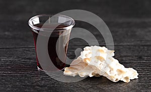 Elements of the Holy Communion or Lords Supper on a Wooden Table