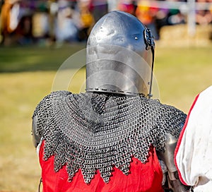Elements of medieval iron knight armor for battle, helmet, spaulders, pouldrons, vambraces, gauntlets