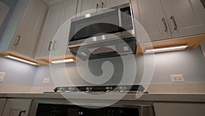 Elements of Modern new Kitchen Interior Design in a newly renovated house, move camera wide footage