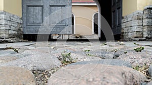 Elements of the urban environment - gates close-up. close-up photo. paving stones in the frame