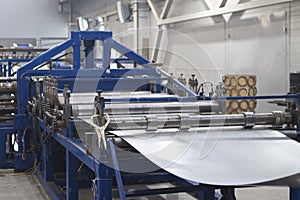 Elements of various sections of the galvanized steel processing line in rolls