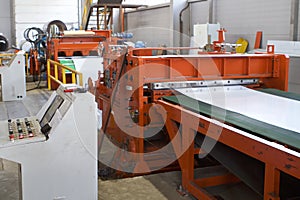 Elements of various sections of the galvanized steel processing line in rolls