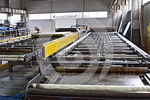 Elements of various sections of the galvanized steel processing line in rolls