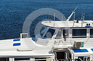 Elements of the white ship view of the captain`s cabin and the sea or ocean. Photo for tourist design