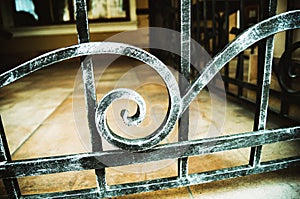 Elements of wrought iron fence in retro style