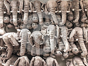 Elephant dolls hang on to the wall for sales in kid depart at departmentstore