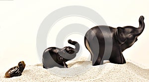 Elephant figurine on an isolated background with different effect