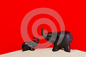 Elephant figurine on an isolated background with different effect