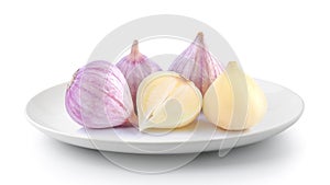 Elephant garlic in a plate isolated on a white background