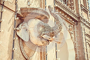 Elephant head sculpture on wall of the royal Palace of Mysore in Indo-Saracenic style, Karnataka state, India.