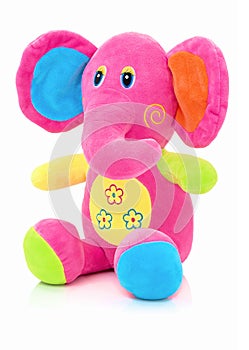 Elephant plushie doll isolated on white background with shadow reflection. Elephant plush stuffed puppet on white backdrop.