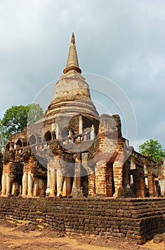 Elephant statue around pagoda at temple, Thailand