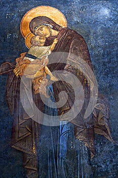 The Eleusa - blessed Virgin Mary and Child. Ancient painted fresco of the Church of the Holy Saviour in Chora in Istanbul, Turkey photo