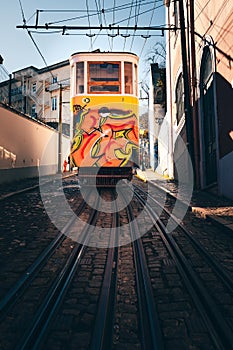 Elevador GlÃ³ria - Restauradores, tram, in Lisbon. Old houses, narrow streets, historic old town Portugal photo