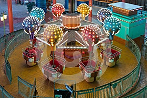 Elevated illuminated air balloon carousel indoor playground