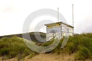 An elevated lifeguard tower on the sand dunes at Benone beach on the north coast of ireland in county Londonderry