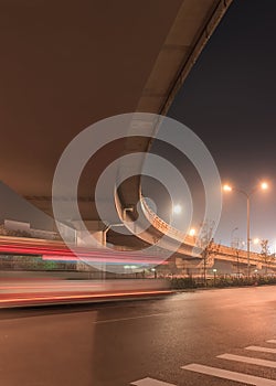 Elevated road and traffic in motion blur at night, Beijing, China