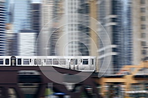 Elevated train in Chicago passing over railway bridge