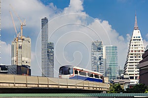 Elevated trains, Bangkok, Thailand. BTS Skytrain outgoing central Bangkok photo