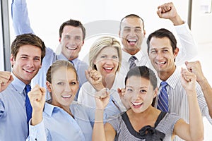 Elevated View Of Happy And Positive Business People