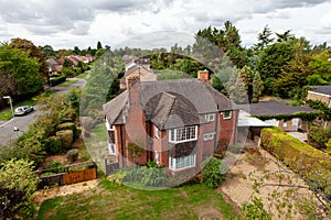 Elevated view of large detached house in suburban England