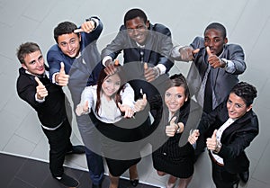 Elevated view of large group of multiethnic business people chee