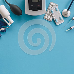 elevated view medical equipments blue background. High quality photo