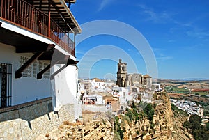 Elevated view of St Peters church and the town with the Parador to the left, Arcos de la Frontera, Spain. photo