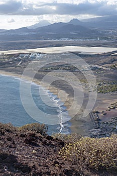 Elevated views from the volcanic peak Montana Roja towards the beach Playa de la Tejita, in Tenerife, Canary Islands, Spain
