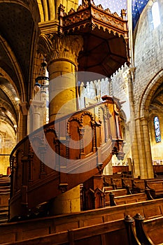 Elevated wooden pulpit in a historical church