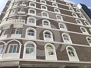 Elevation of an Hotel building with lot of Glass reinforced concrete works for elevation decoration for an hotel rooms and lodging