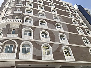 Elevation of an Hotel building with lot of Glass reinforced concrete works for elevation decoration for an hotel rooms and lodging